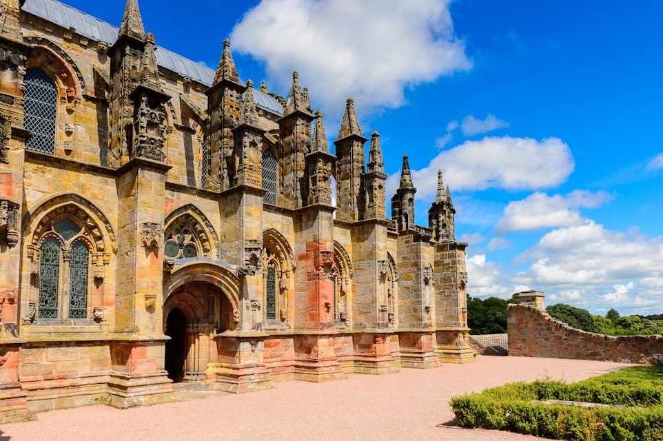 ROSLIN, SCOTLAND - JULY 18, 2016: Rosslyn Chapel (Collegiate Chapel of St Matthew), found by  by William Sinclair. It was mentioned in The Da Vinci Code book