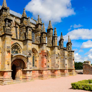 ROSLIN, SCOTLAND - JULY 18, 2016: Rosslyn Chapel (Collegiate Chapel of St Matthew), found by by William Sinclair. It was mentioned in The Da Vinci Code book