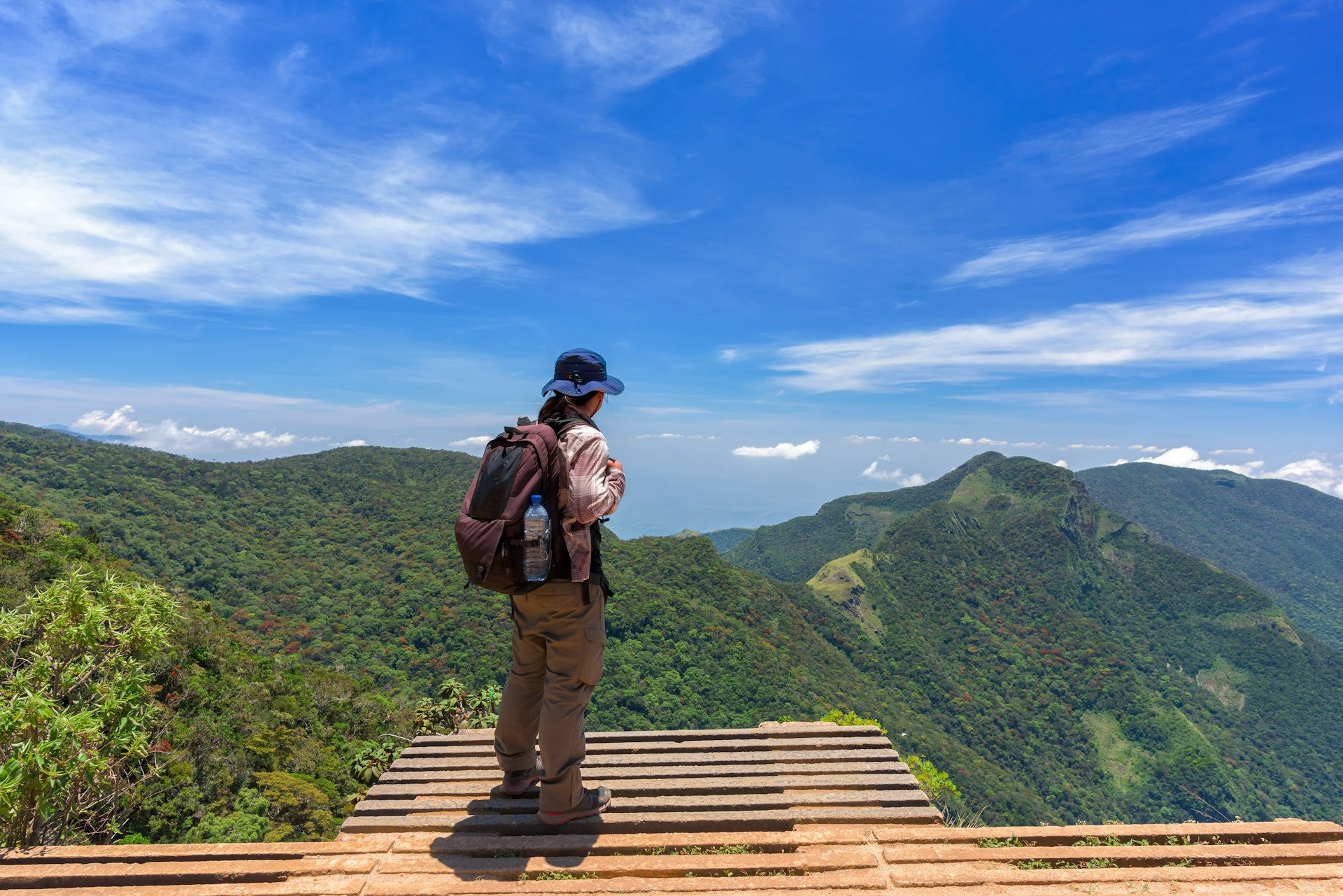 Man looking over the drop at World's End, Horton Plains National Park