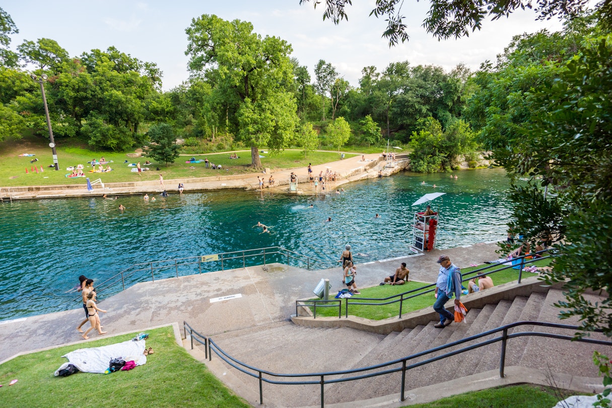 JULY 2017: Visitors enjoy the natural water of Barton Springs pool in Austin.