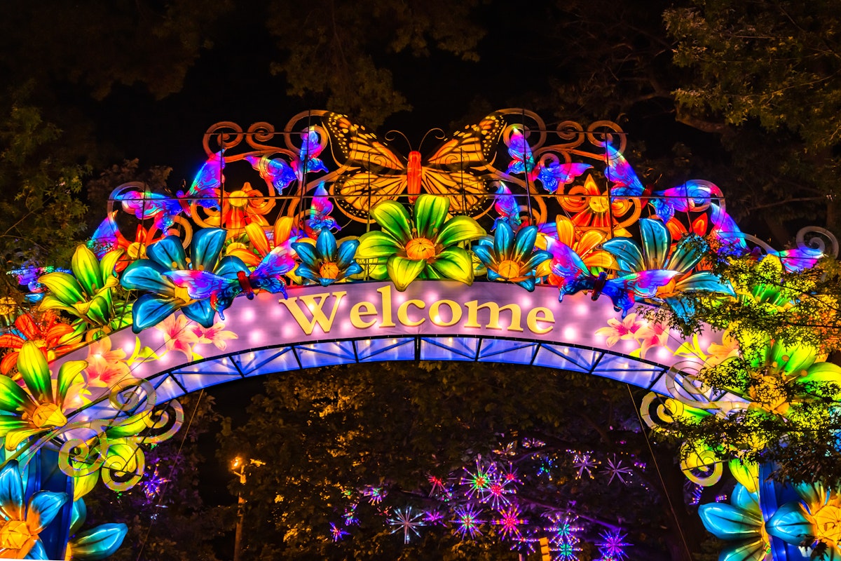 Boston, MA - 9/11/20: A welcome arch of butterflies and flowers made of traditional Chinese lanterns, spans the entry of the Franklin Park zoo for Boston Lights; Shutterstock ID 1824698471; your: Claire Naylor; gl: 65050; netsuite: Online Editorial; full: Boston POIs
