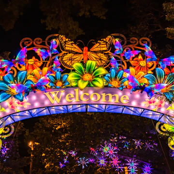 Boston, MA - 9/11/20: A welcome arch of butterflies and flowers made of traditional Chinese lanterns, spans the entry of the Franklin Park zoo for Boston Lights; Shutterstock ID 1824698471; your: Claire Naylor; gl: 65050; netsuite: Online Editorial; full: Boston POIs