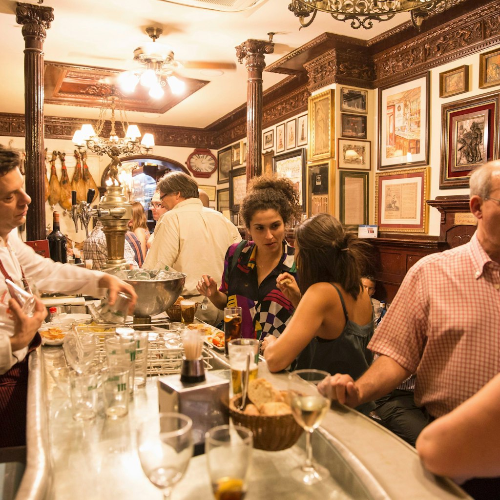 Guests at the 'Casa Alberto' tapas bar in Madrid, Spain.