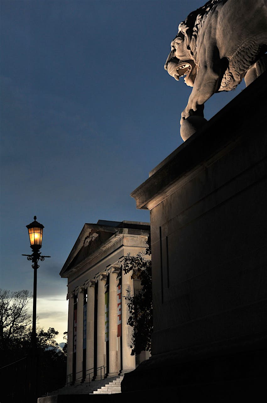 Contemporary Wing of the Baltimore Museum of Art - Baltimore, MD Exterior view of The Baltimore Museum of Art at night. There is a large gargoyle on the roof of the building