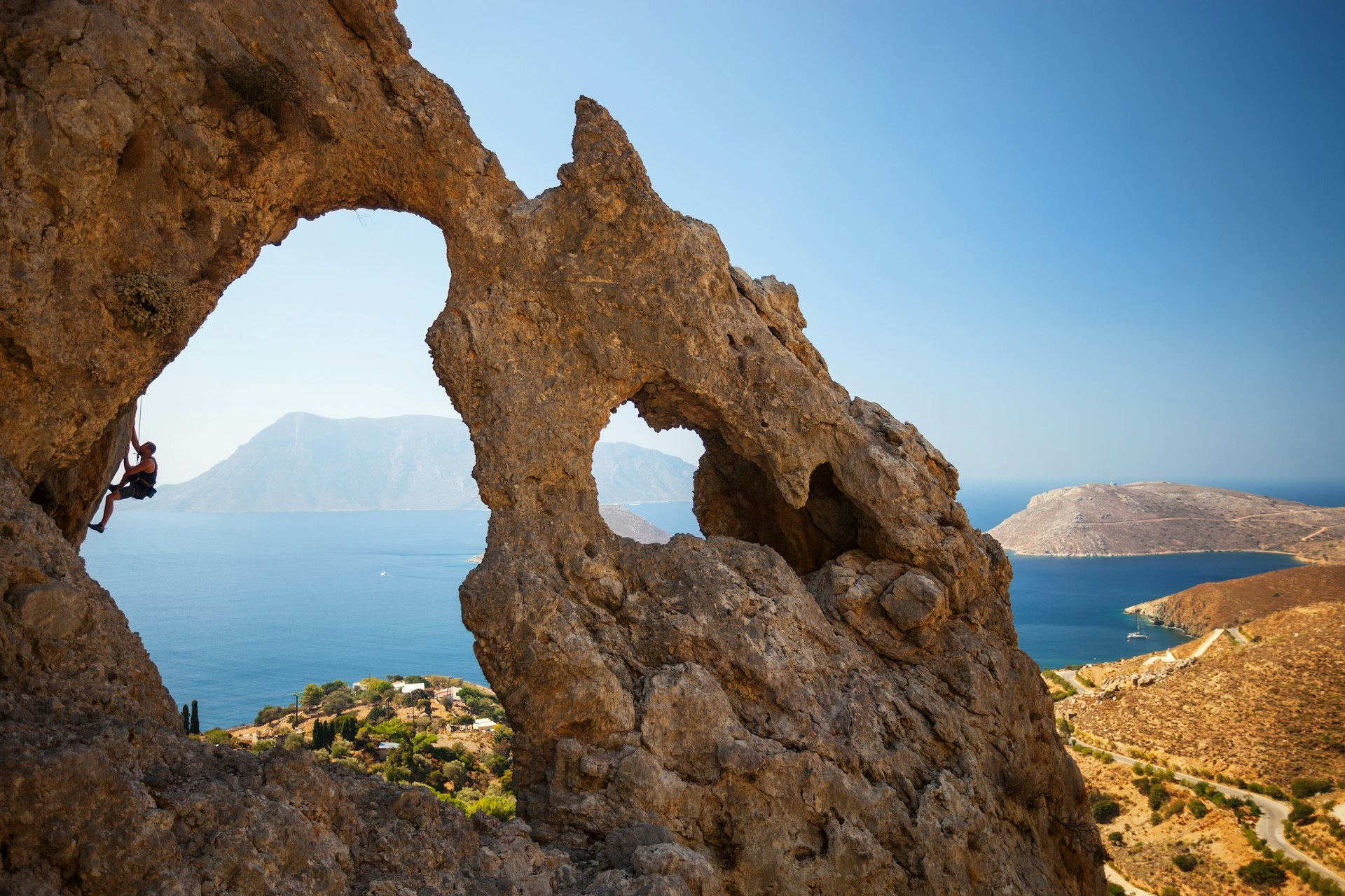 Rock,Climber,On,A,Cliff.,Kalymnos,Island,,Greece.