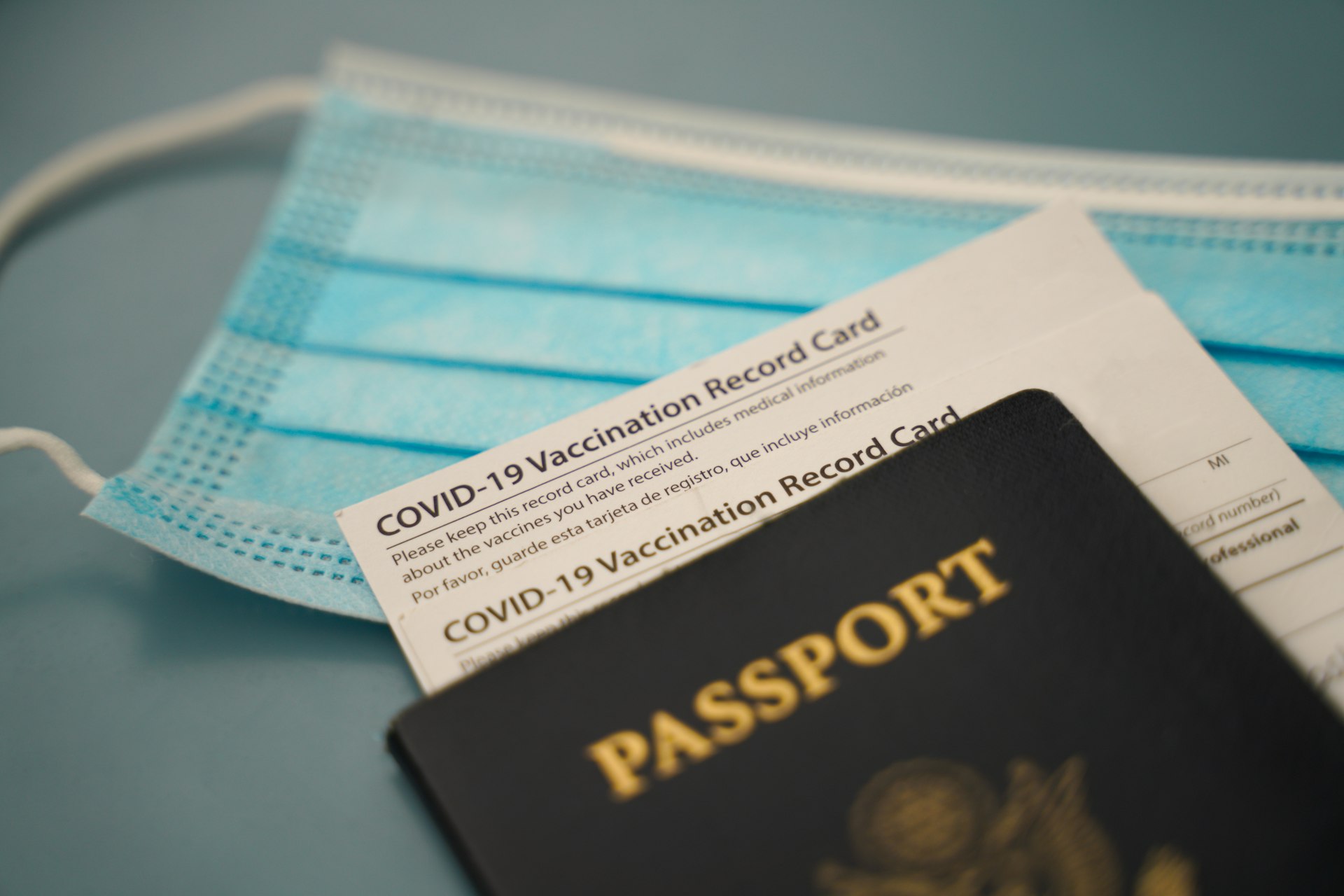 A passport and COVID-19 vaccine card. 