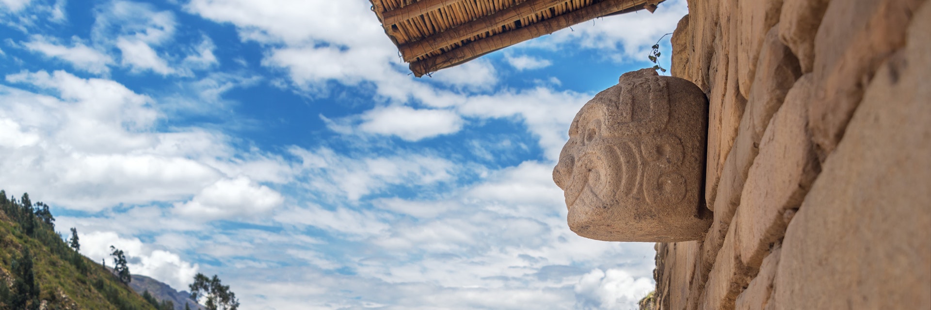 Stone mask on the ancient temple at Chavin de Huantar in Peru