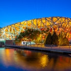 May 6, 2019: Exterior of Beijing National Stadium (also known as the Bird's Nest) lit up at night.