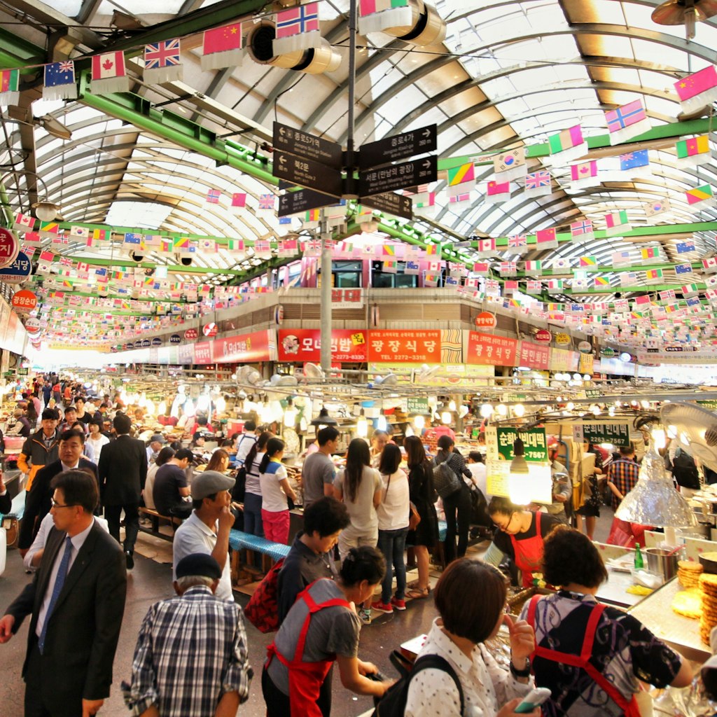 The famous Gwangjang Market in Seoul, South Korea. Thousands of people, vendors, and amazing street food.