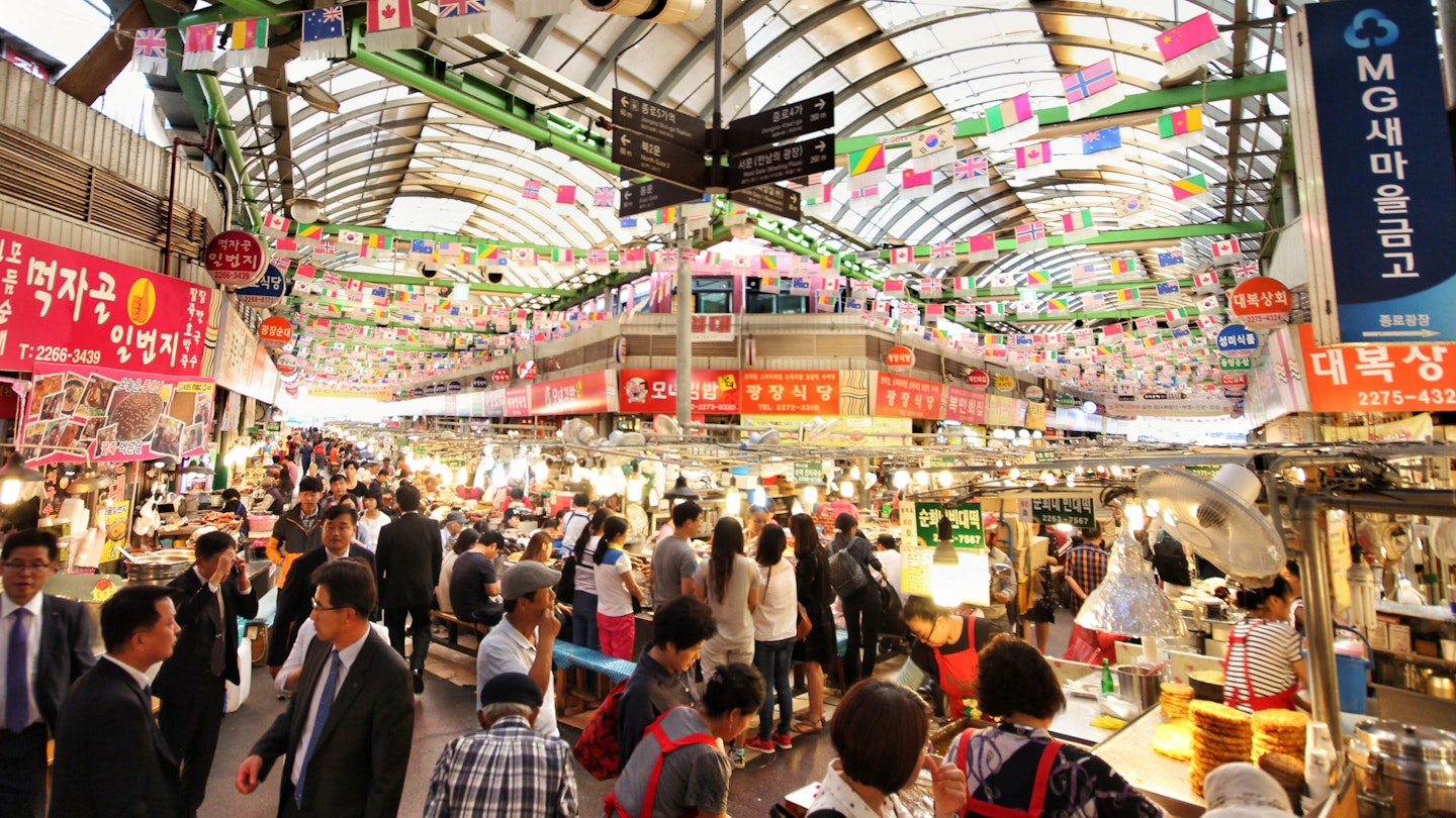 The famous Gwangjang Market in Seoul, South Korea. Thousands of people, vendors, and amazing street food.