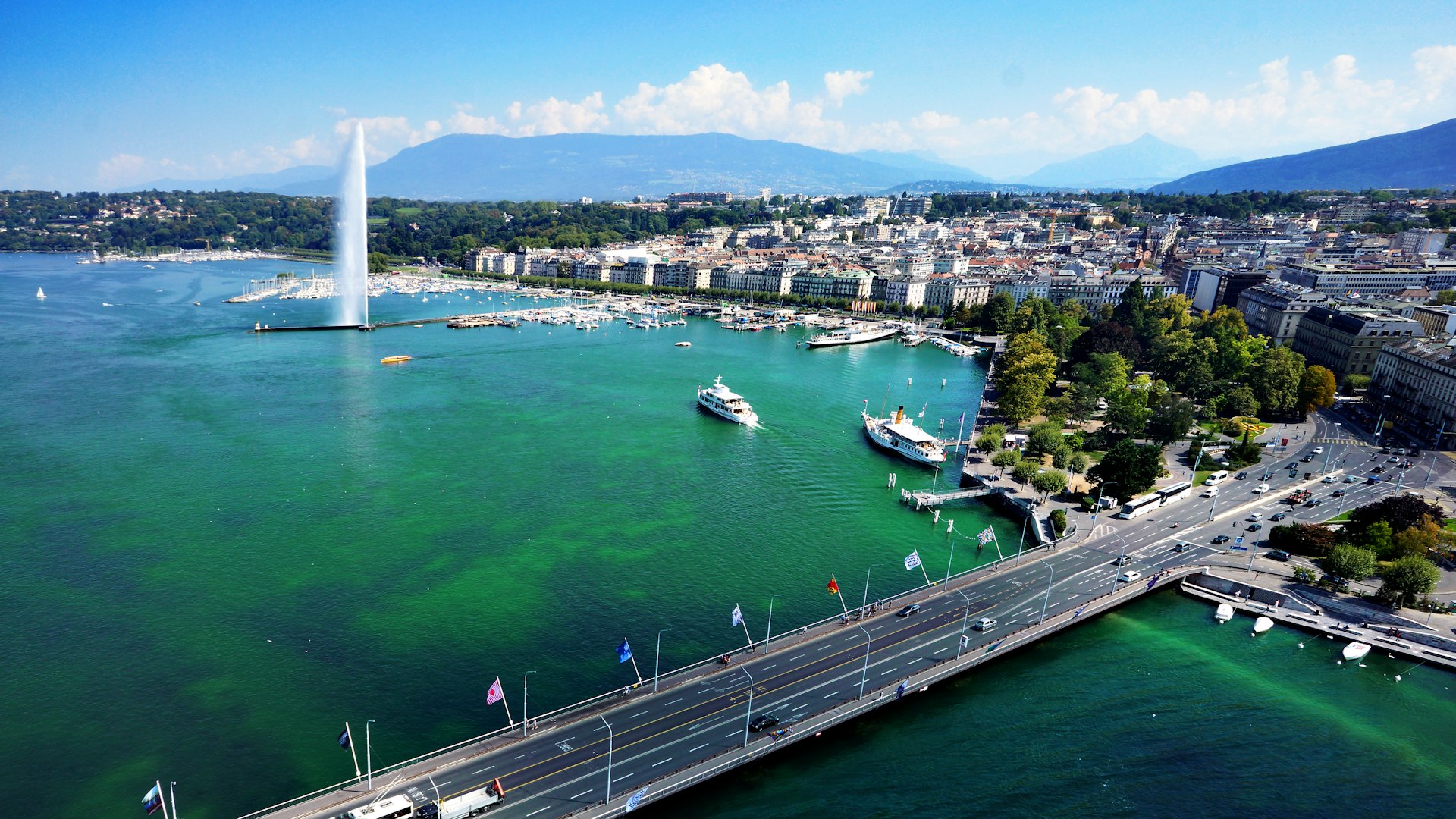 A bridge crosses a section of Lake Geneva, Switzerland