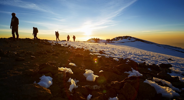 Mt Kilimanjaro, with 5.895 m Africas highest mountain as well as worlds highest free-standing mountain. At the Machame route, shot at an altitude of approx. 5800 m. Route to the summit, a number of people climb the last stretch to the top, Tanzania.