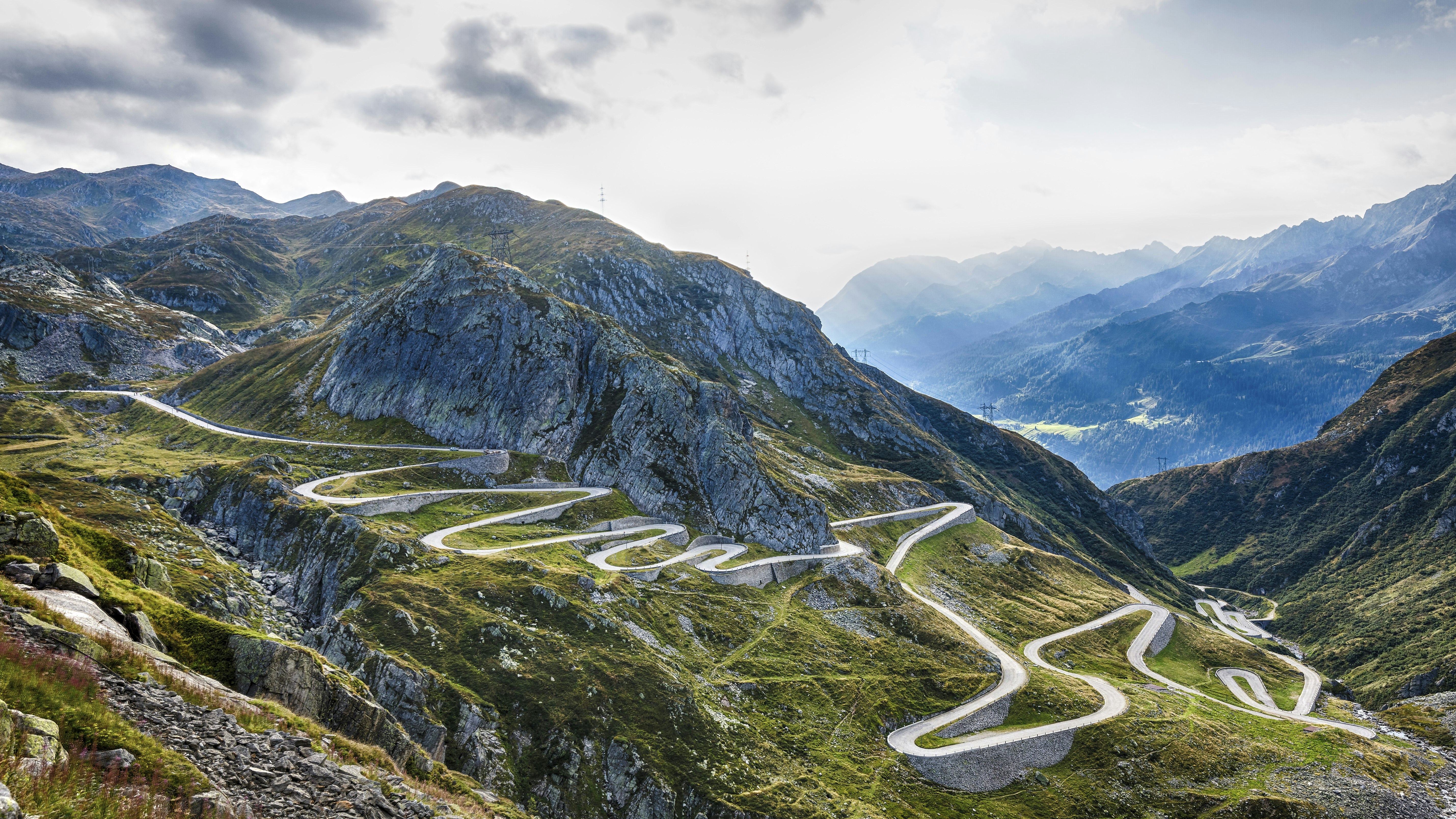 The Gotthard Pass weaves down a mountain in Switzerland, with many switchbacks