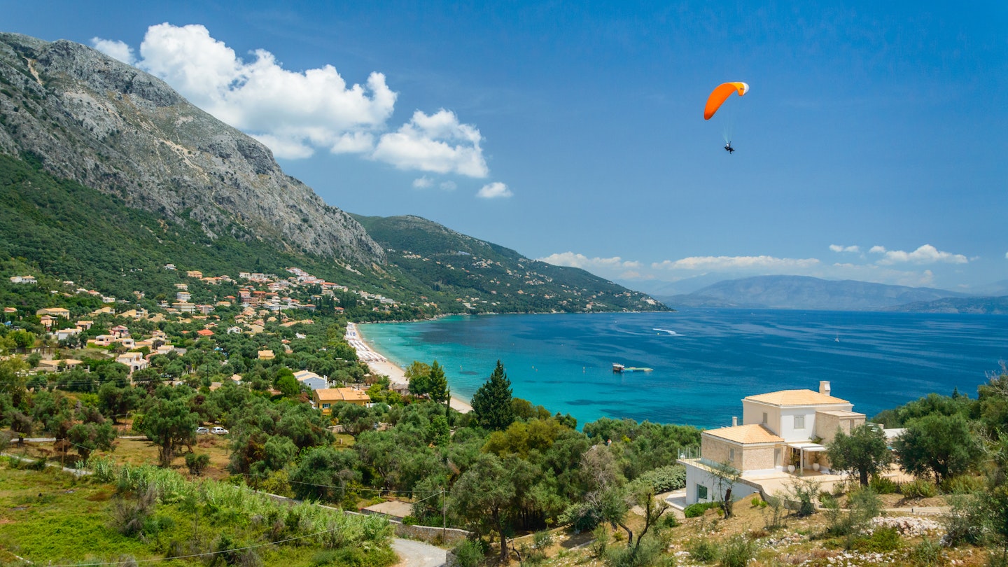 The strong northern wind and incredible views make Greek islands like Corfu great for paragliding. 