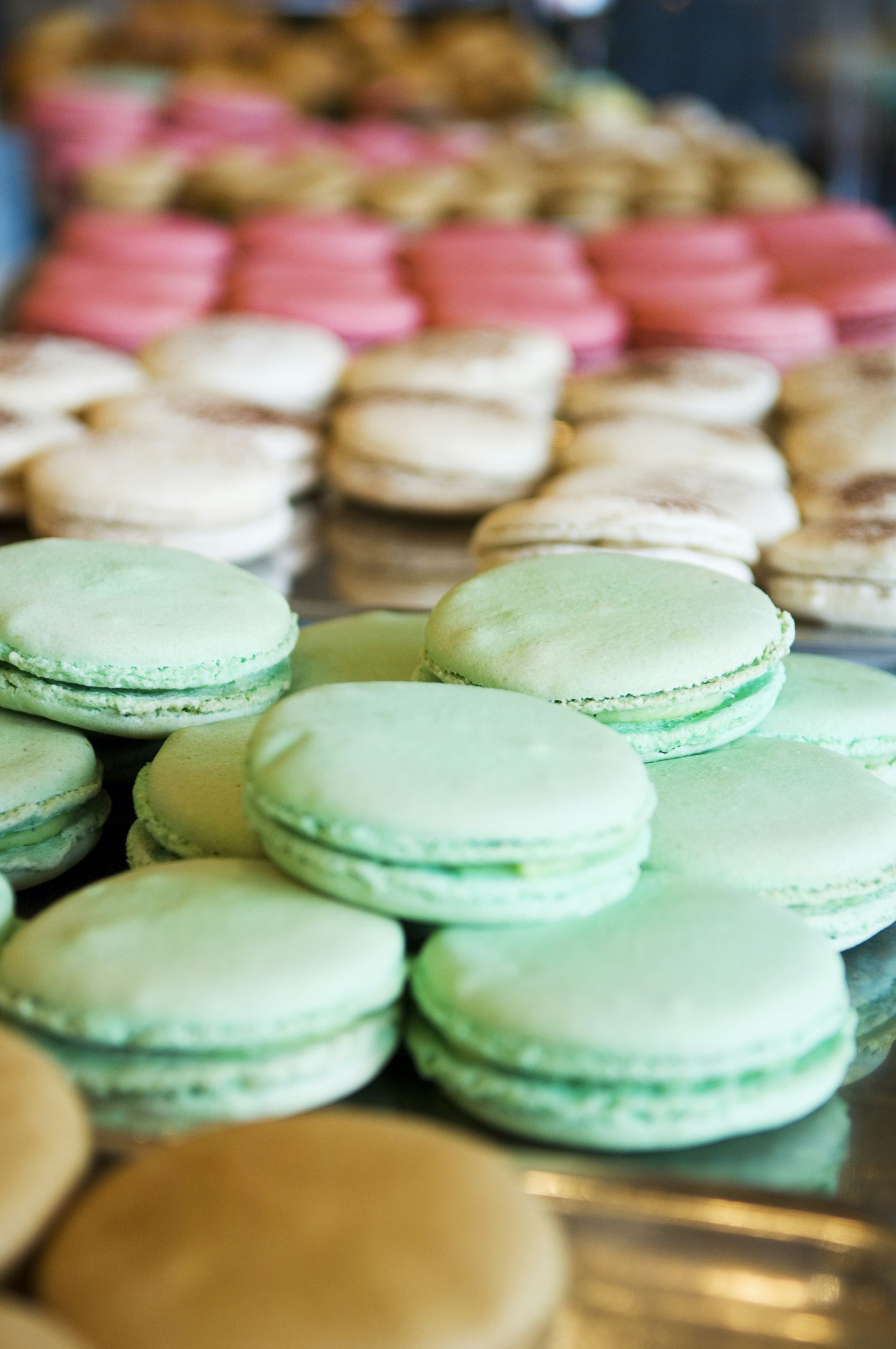 Brightly-coloured macaroons for sale at Angelina Tea Room in Paris, France.
