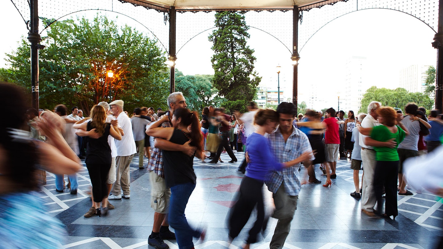 People dancing in rotunda.