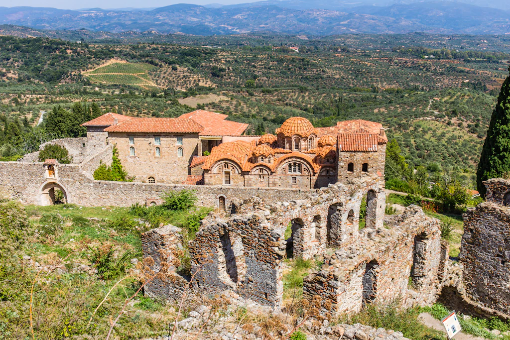 Byzantine church in medieval city of Mystras An aerial view of a partly-ruined Byzantine church in medieval city of Mystras, Greece.