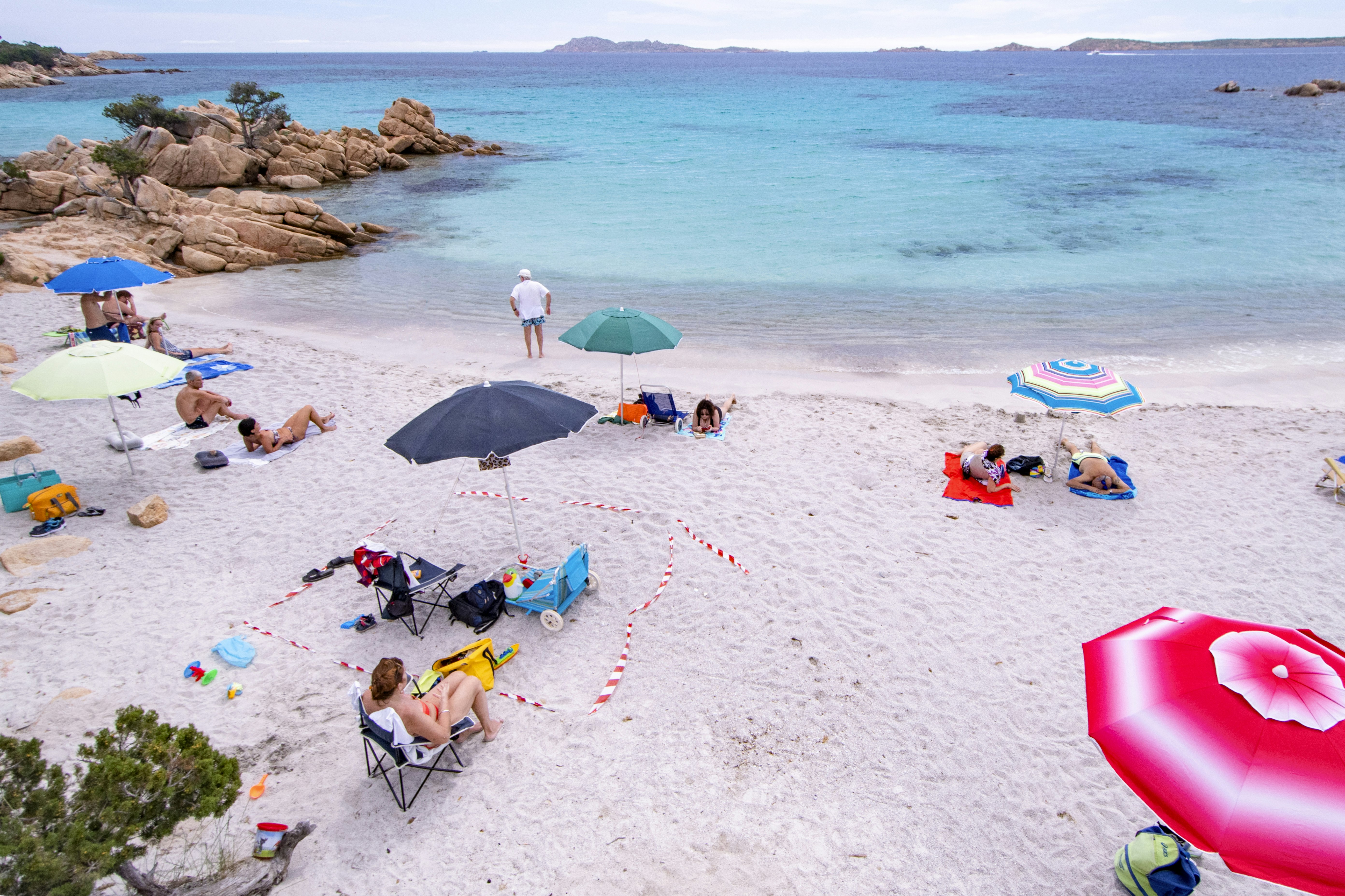 Beach in Sardinia with social distancing markers