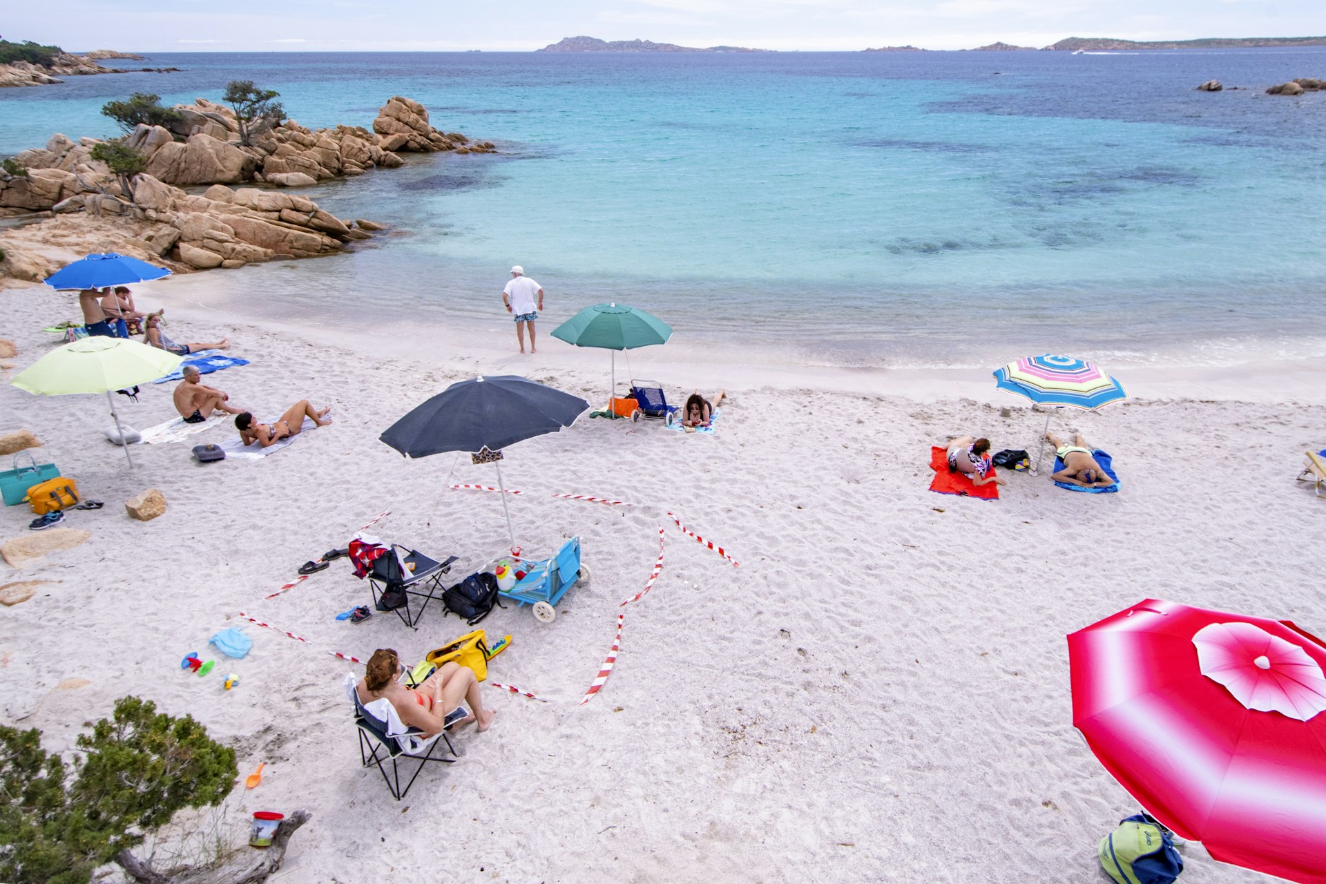 Beach in Sardinia with social distancing markers