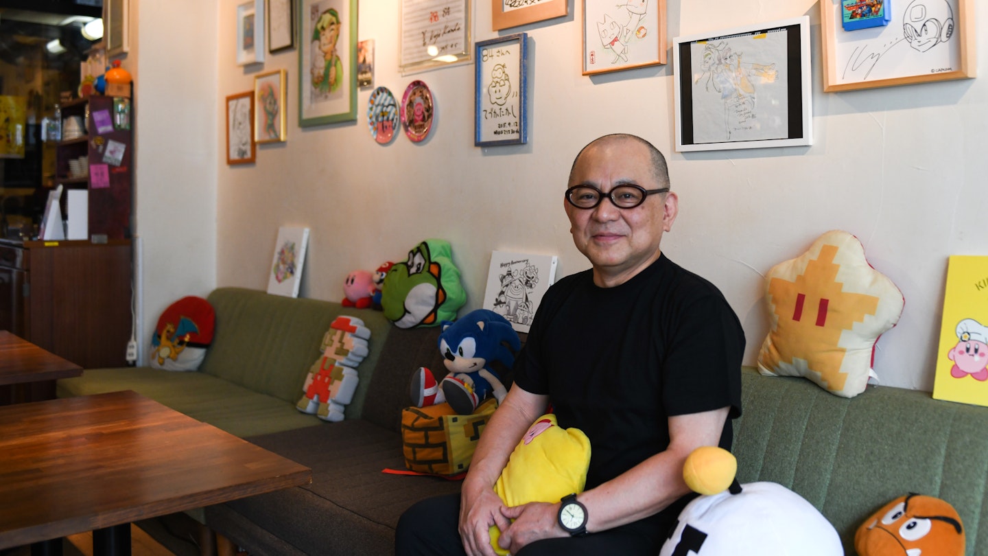 Toru Hashimoto sits inside 84, a secret café for Nintendo fans, in Tokyo, Japan, on Thursday, June 24, 2021. Tucked away at the back of a nondescript building in the hip Shibuya district, the establishment named 84 is the brainchild of a former Nintendo Co. employee Hashimoto, who initially conceived it as a sanctuary for game developers to nerd out and relax. Photographer: Noriko Hayashi/Bloomberg via Getty Images