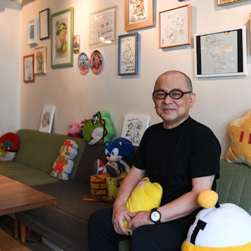 Toru Hashimoto sits inside 84, a secret café for Nintendo fans, in Tokyo, Japan, on Thursday, June 24, 2021. Tucked away at the back of a nondescript building in the hip Shibuya district, the establishment named 84 is the brainchild of a former Nintendo Co. employee Hashimoto, who initially conceived it as a sanctuary for game developers to nerd out and relax. Photographer: Noriko Hayashi/Bloomberg via Getty Images