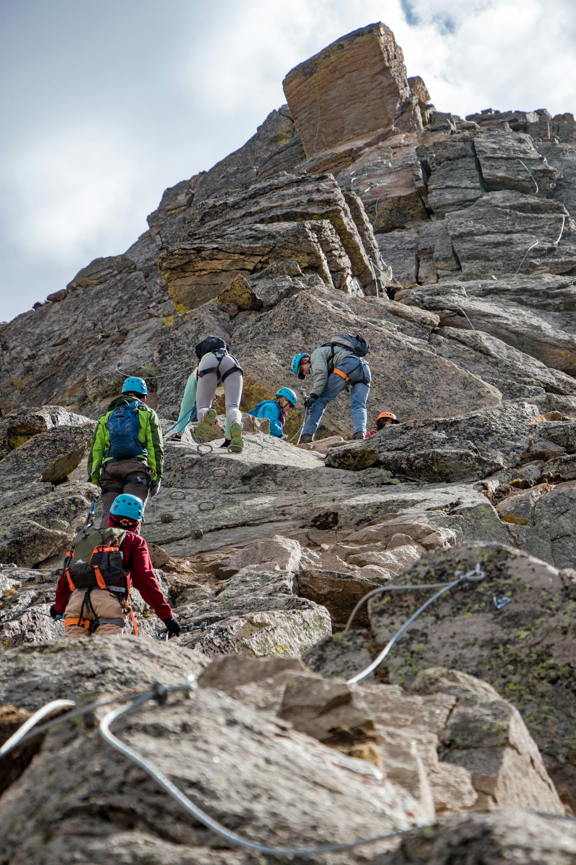 Climbers ascend the via ferrata