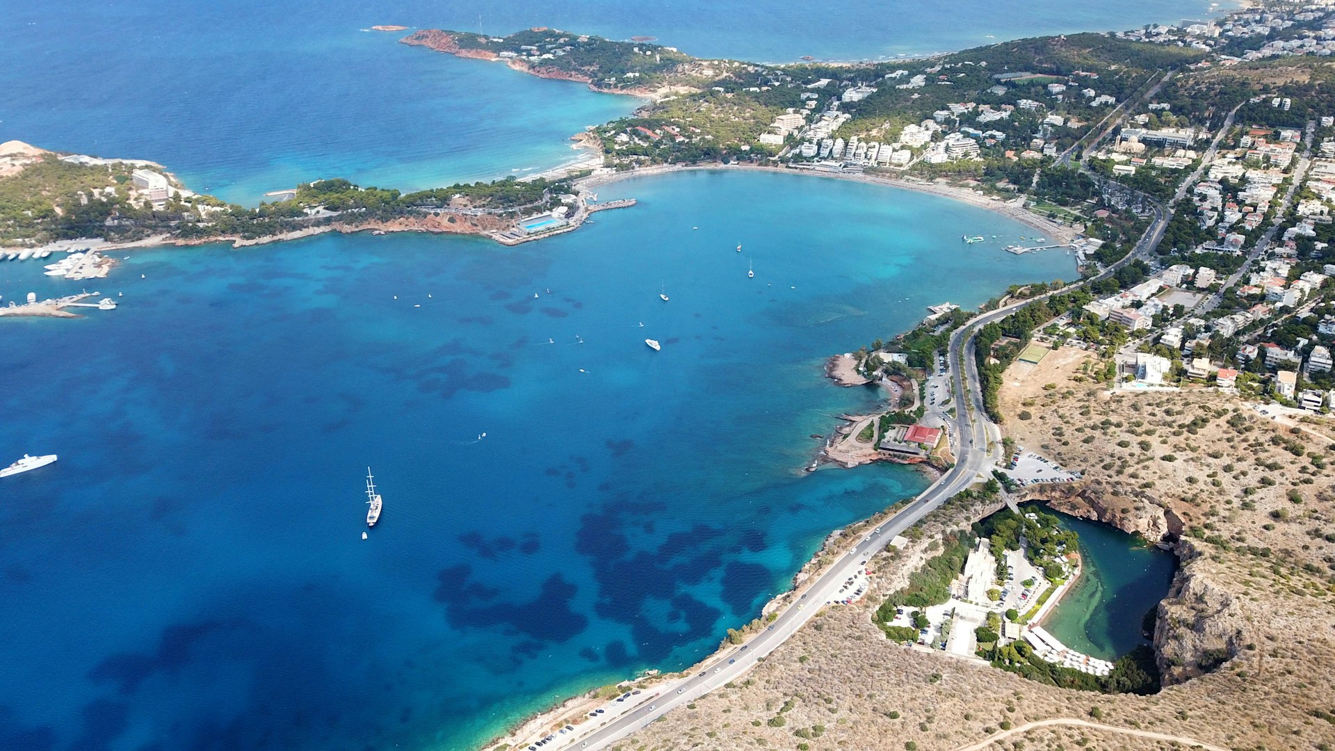 Aerial of lake Vouliagmeni and the Ateras Peninsula near Athens, Greece.