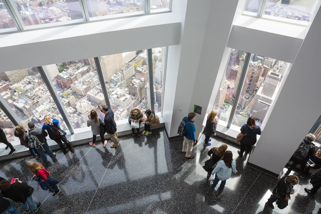 People looking at the view from One World Trade Center