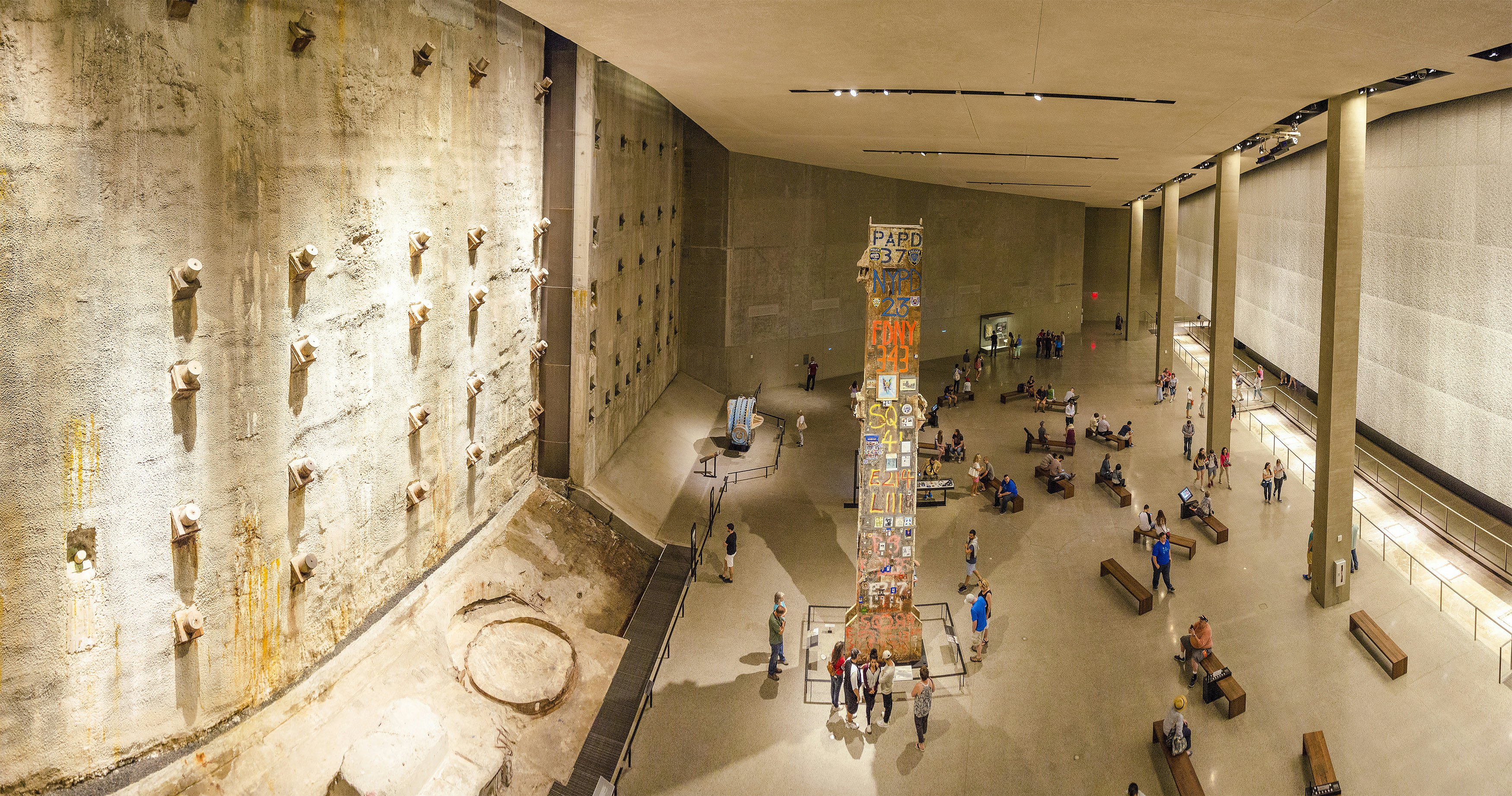 NEW YORK CITY, USA - JUNE 18 2016 - Panoramic view of the interior  National 9/11 Memorial Museum. The Last Column Remnants and Slurry Wall. Ground Zero in Lower Manhattan, New York City, USA