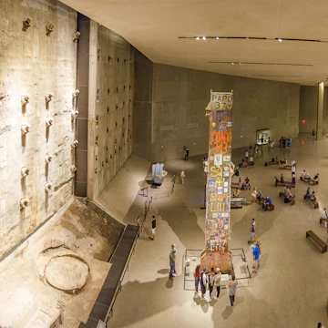 NEW YORK CITY, USA - JUNE 18 2016 - Panoramic view of the interior National 9/11 Memorial Museum. The Last Column Remnants and Slurry Wall. Ground Zero in Lower Manhattan, New York City, USA