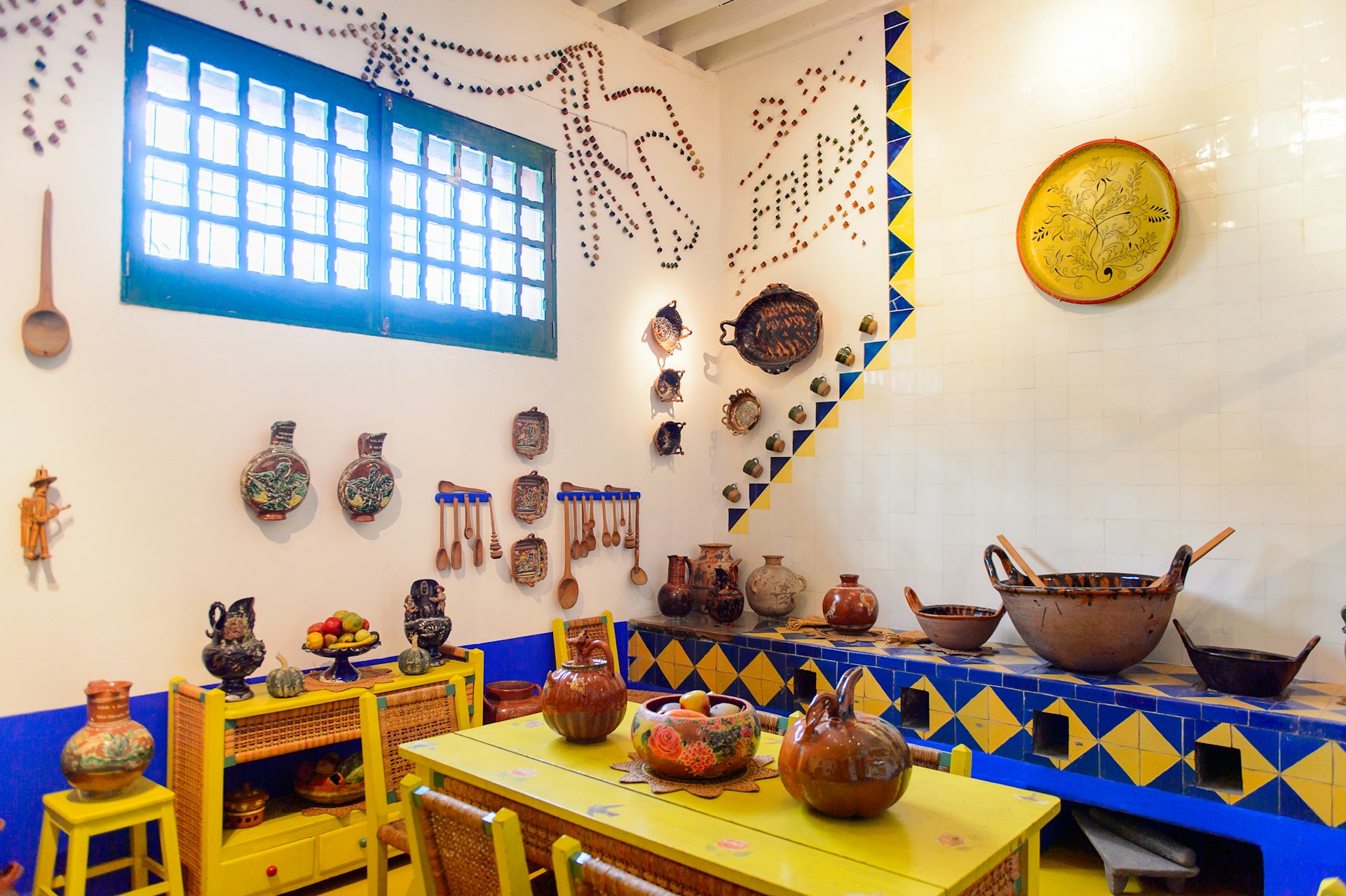 Colorful pottery and tiles in Casa Azul, Frida Kahlo's home in Mexico City