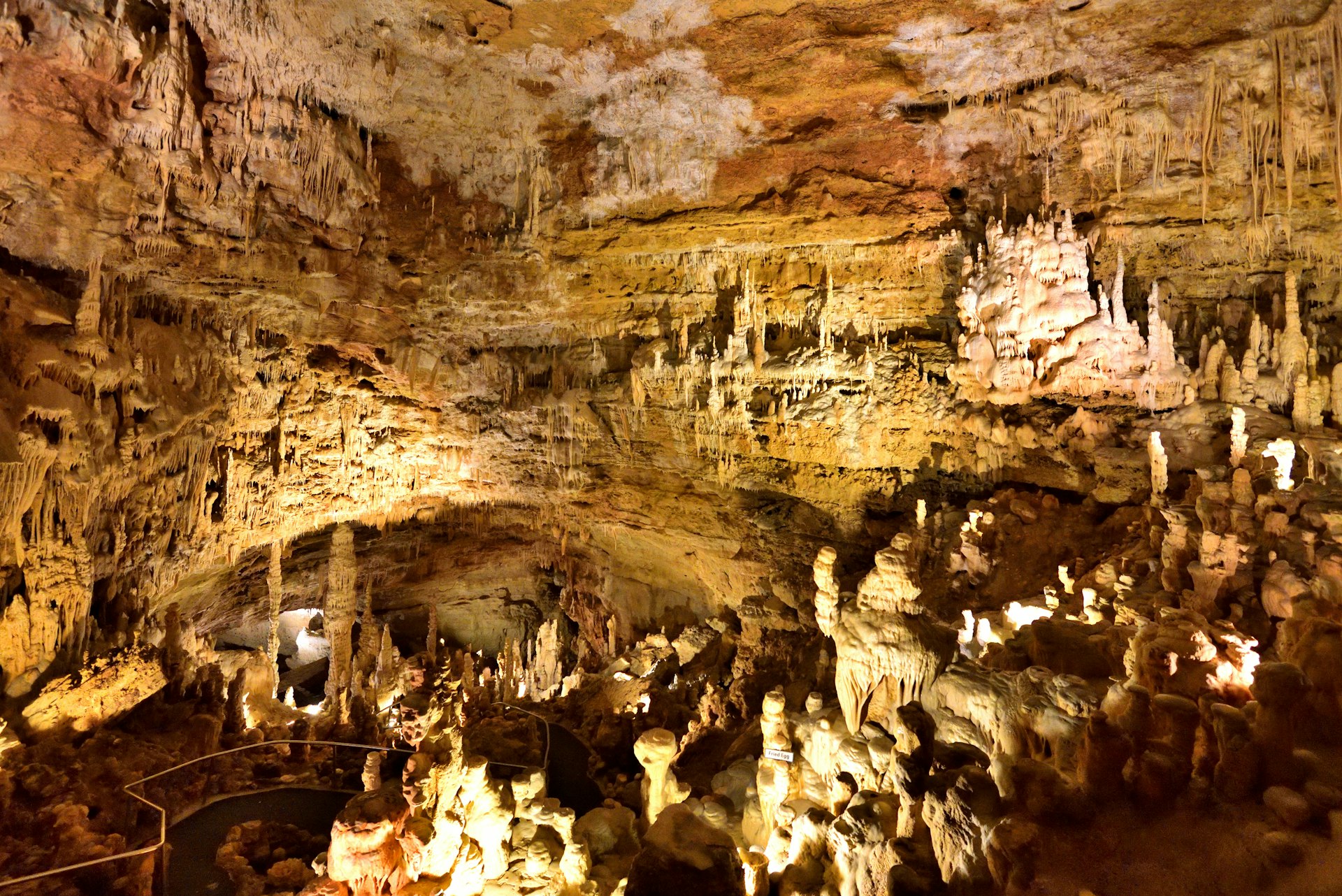 A cavern with an intricate web of stalactites and stalagmites