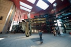 Madrid, Spain - March 22, 2012: tourists visit Nouvel Edifice in the museum Reina Sofia. This museum  is dedicated to the exhibition of modern and contemporary art.