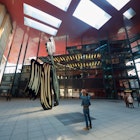 Madrid, Spain - March 22, 2012: tourists visit Nouvel Edifice in the museum Reina Sofia. This museum  is dedicated to the exhibition of modern and contemporary art.