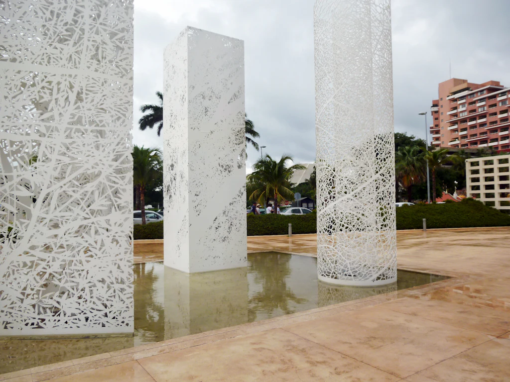 Three columns at the entrance of Maya Museum of Cancun Three columns at the entrance of Maya Museum of Cancun