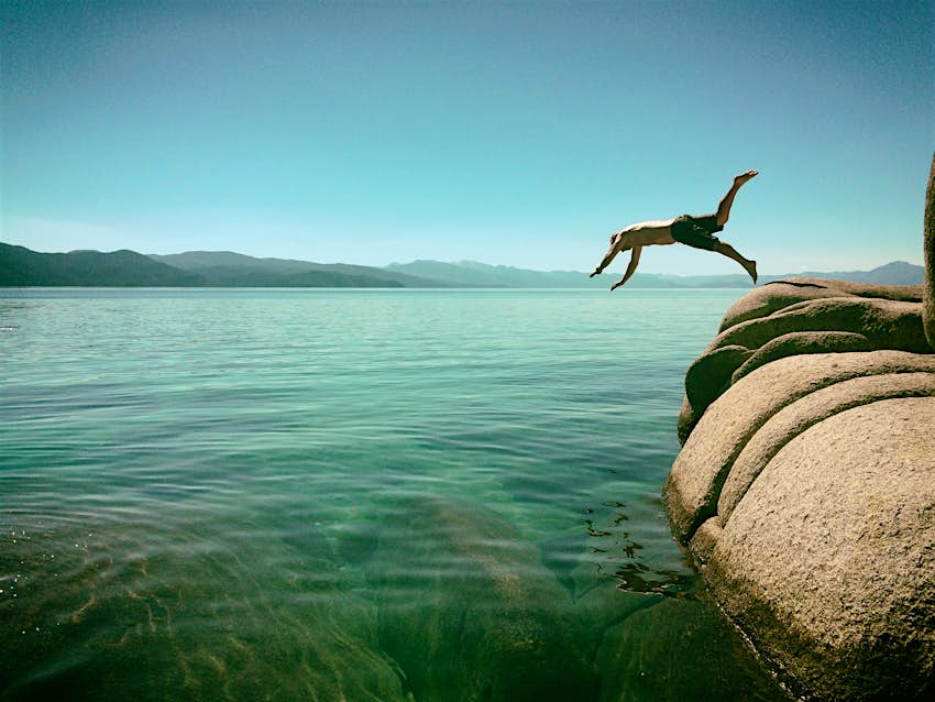 Man jumping into Lake Tahoe, California