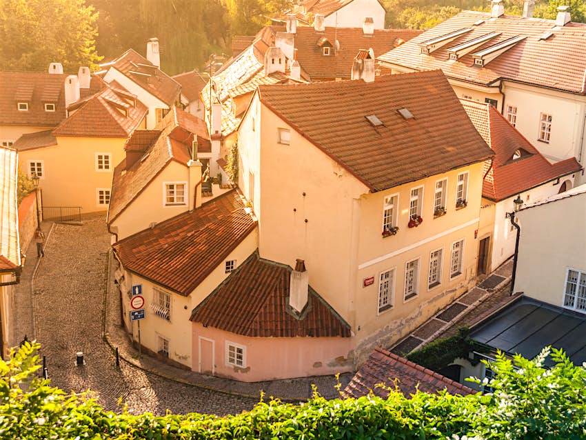 Aerial view of old medieval narrow cobbled street and small ancient houses of Novy Svet, Hradcany district, Prague, Czech Republic Aerial view of old medieval narrow cobbled street and small ancient houses of Novy Svet, Hradcany district, Prague, Czech Republic