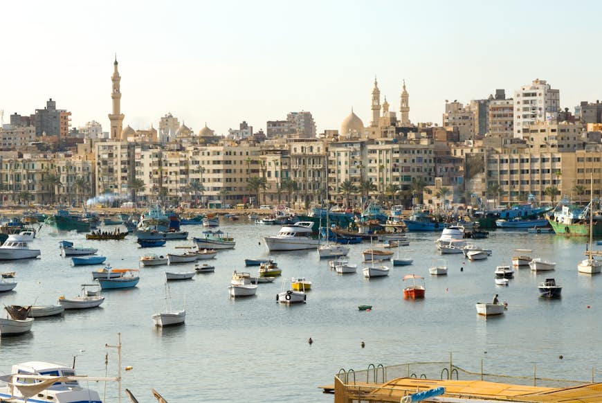 Boats on the shoreline in Alexandria, Egypt