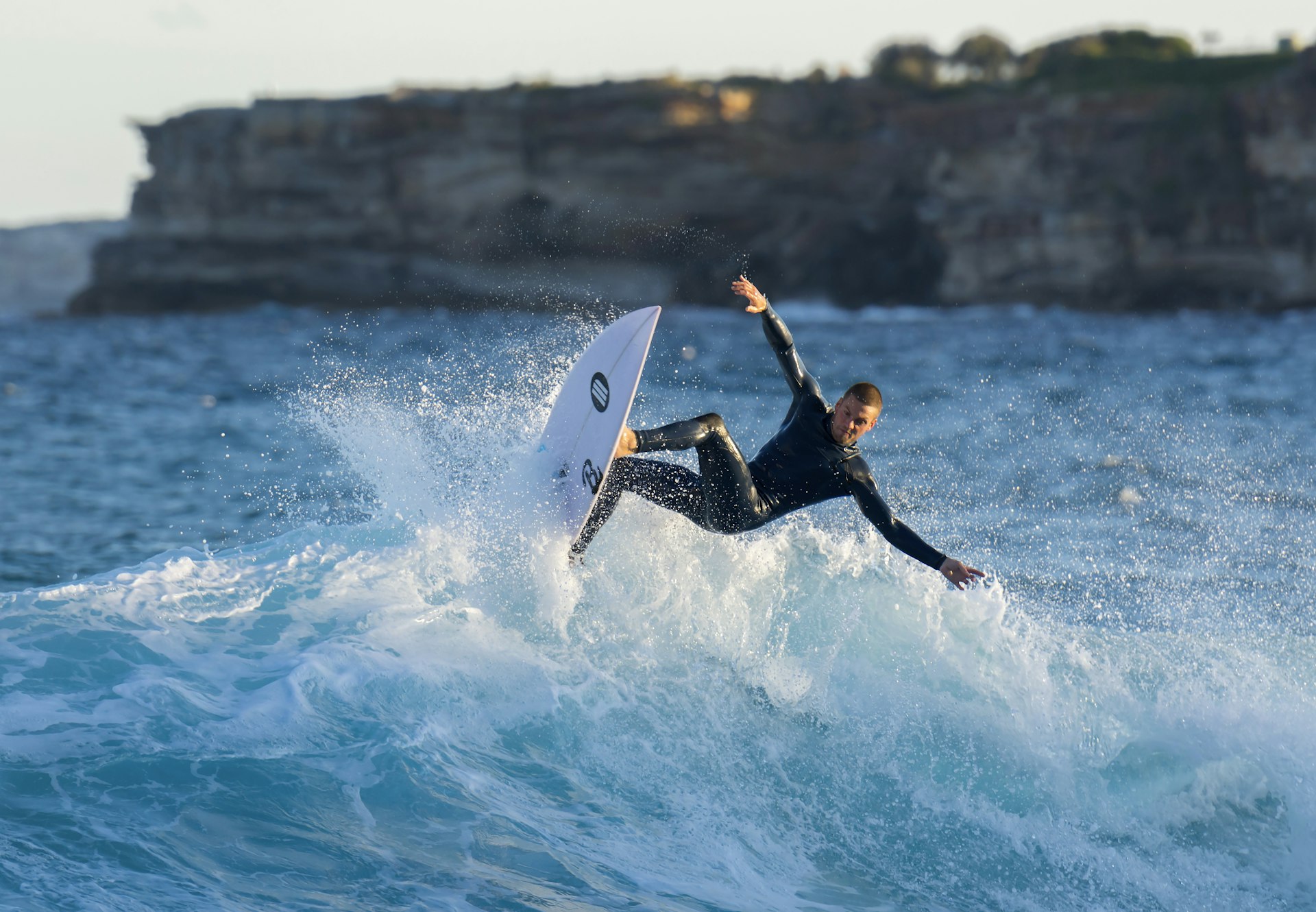 Surfer surfing at Tamarama beach