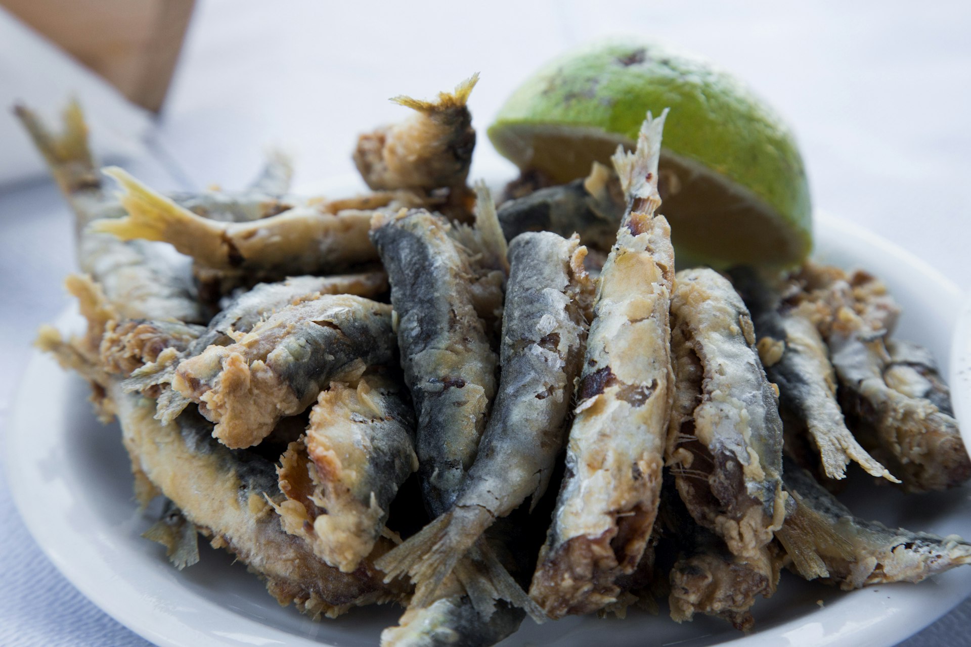 Plate of fried sardines at taverna