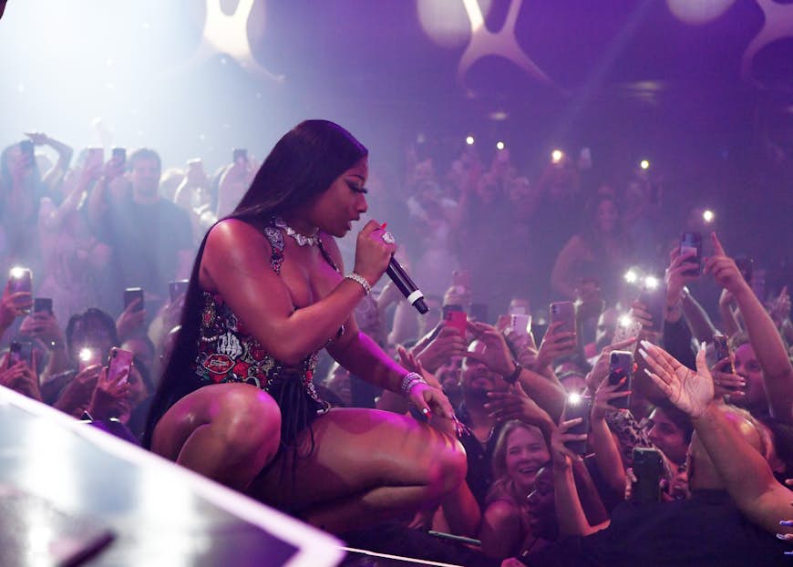 Megan Thee Stallion greets her audience from the stage of Hakkasan in Vegas