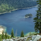 Emerald Bay, SOUTH LAKE TAHOE, CA - July 22, 2015: Emerald Bay State Park is located at the southern end of Lake Tahoe California which is a National Natural Landmark. Within the park you"u2019ll find Eagle Falls, Vikingsholm mansion, and trails that take you to Desolation Wilderness. In the photo you can see Fannette island.