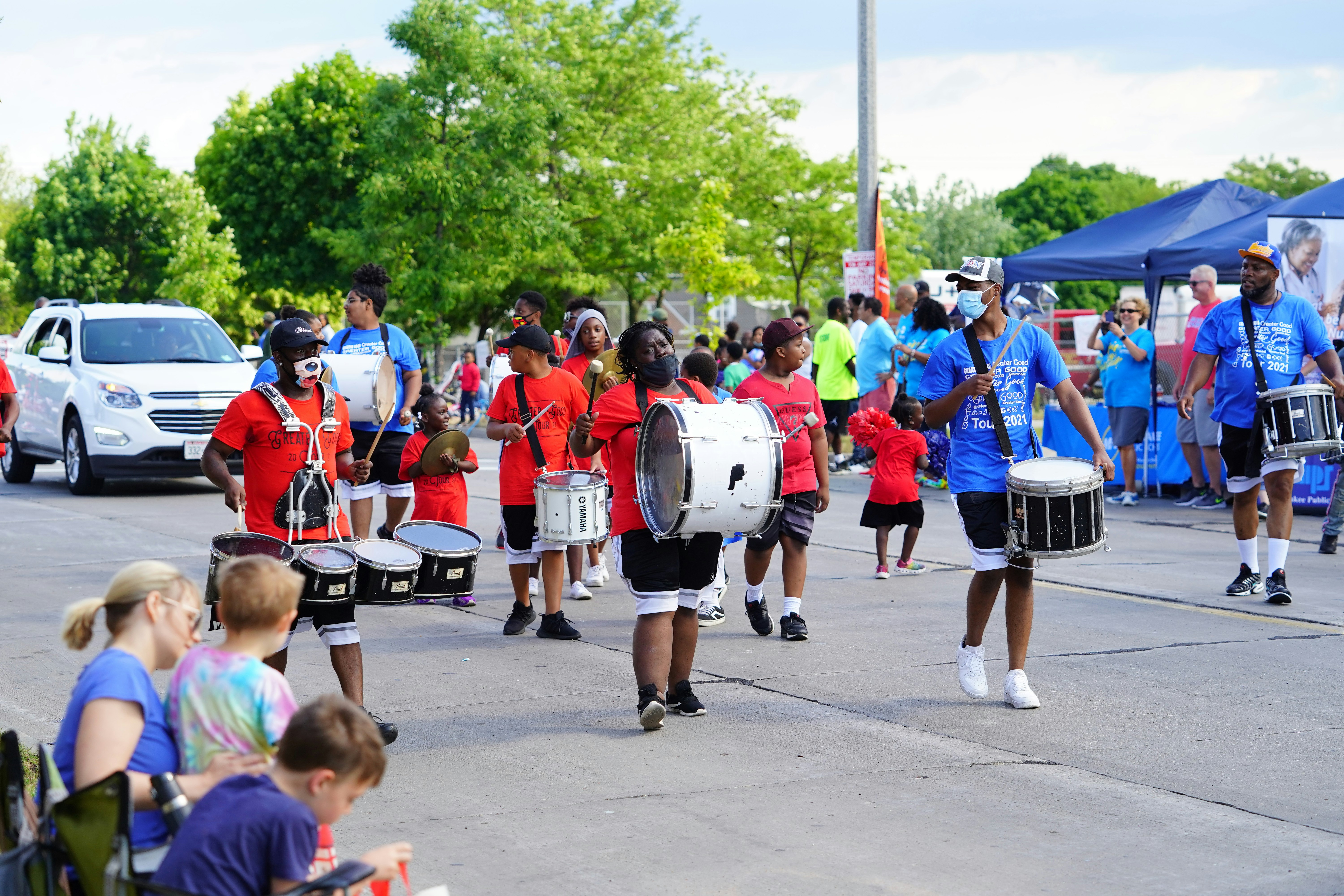 Participants walking in the streets for the Juneteenth parade in Milwaukee, Wisconsin