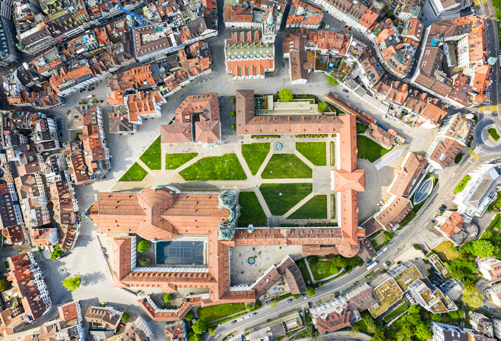 Top down view of St Gallen old town in eastern Switzerland An aerial, top-down view of St Gallen Abbey, which is located in the centre of the city's old town. The old monastery is a square complex of buildings and contains what is now a cathedral.