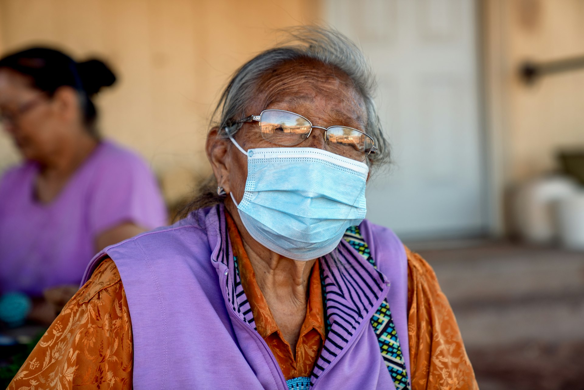 The Matriarch Of A Navajo Family Wearing A Mask At Her Home On The Reservation, Monument Valley, Covid19