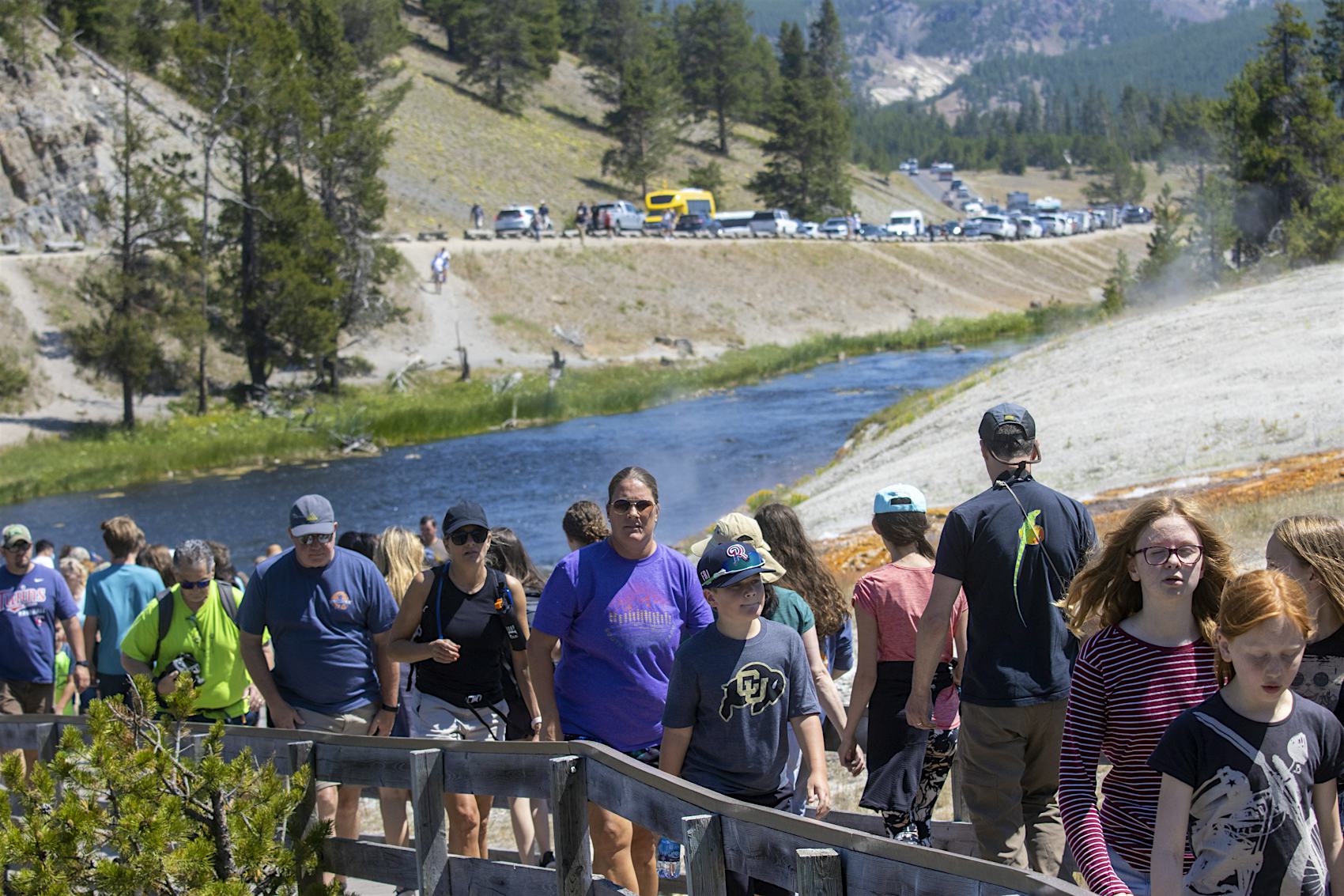 Long lines of people and cars waiting for entry to a US national park