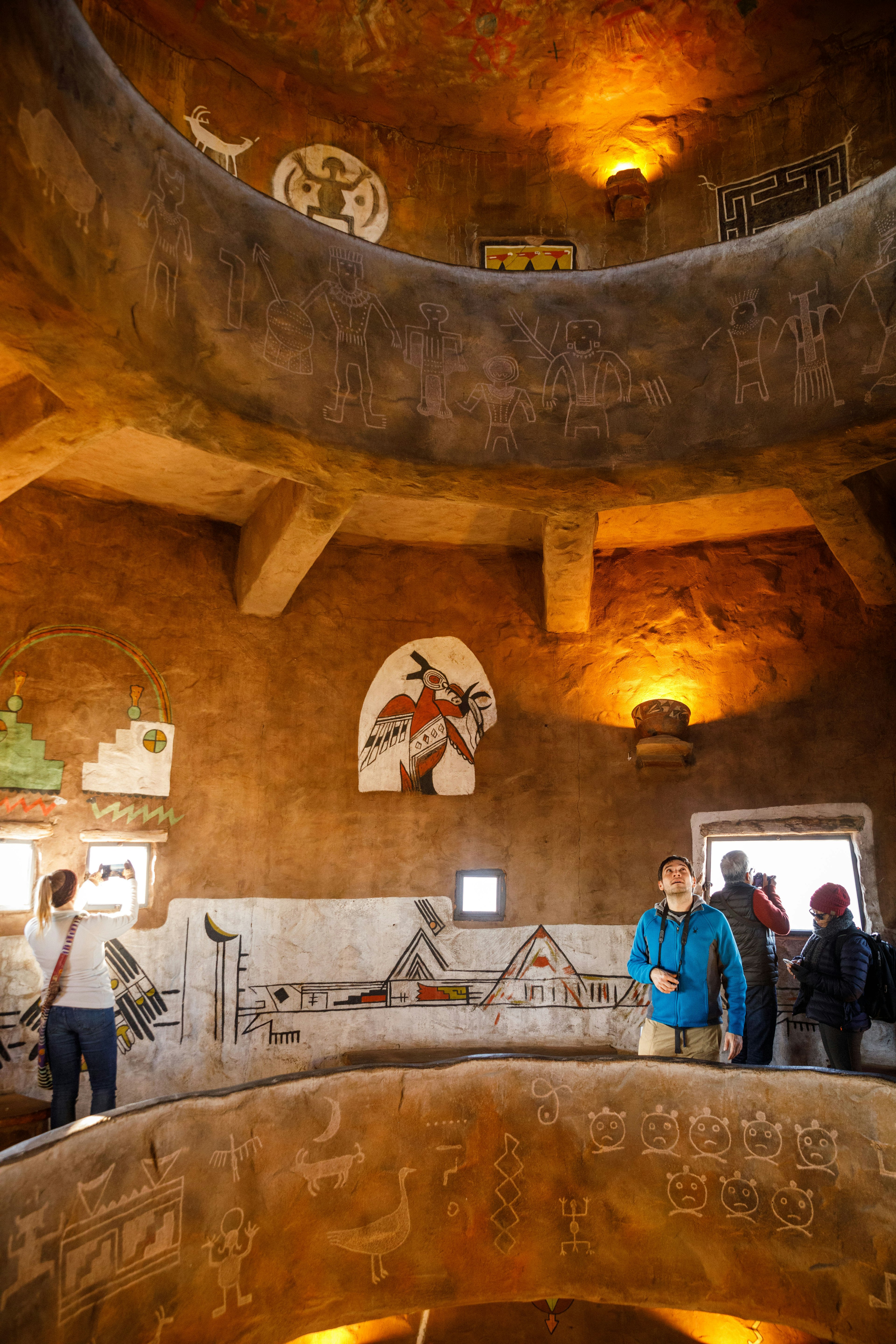 Native American murals decorate a room