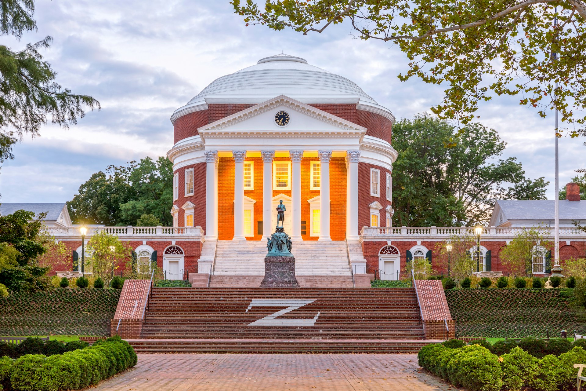 The Rotunda at the University of Virginia at sunset with the Thomas Jefferson statue in Charlottesville, Virginia