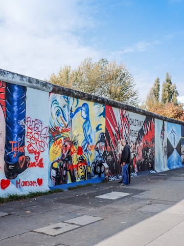 BERLIN, GERMANY- October 15, 2014: Berlin Wall was a barrier constructed starting on 13 August 1961. East Side Gallery is an international memorial for freedom. October 15, 2014 in Berlin