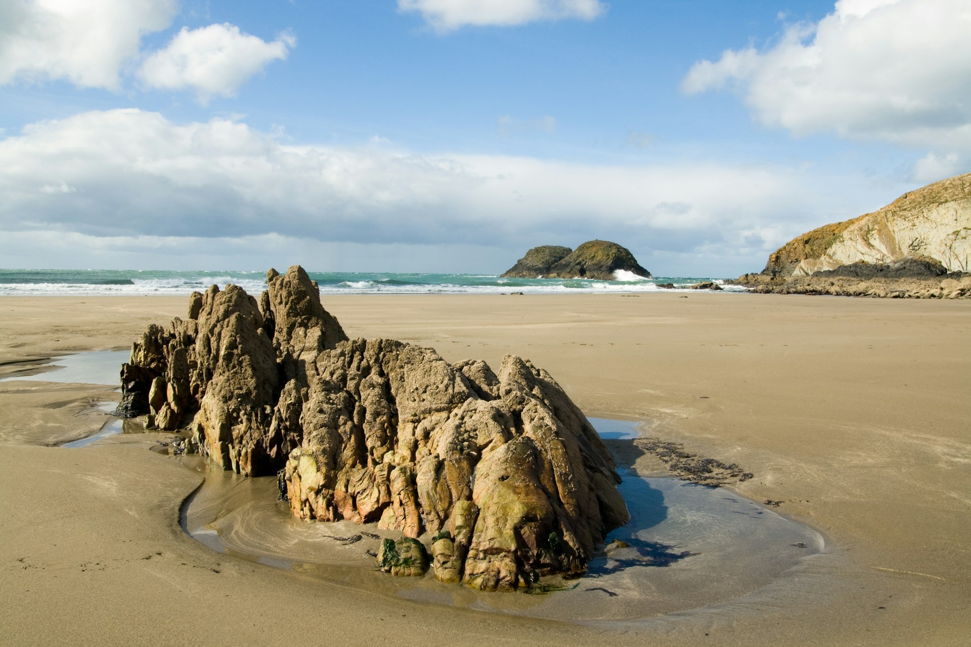 View of rocks and Marloes Sands beach in Wales on a sunny day